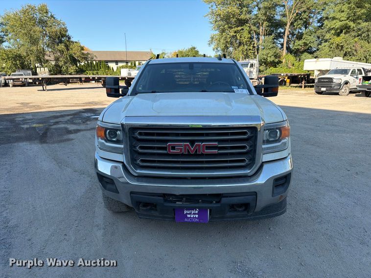 image for item FG3038 2018 GMC Sierra 2500HD Crew Cab flatbed pickup truck