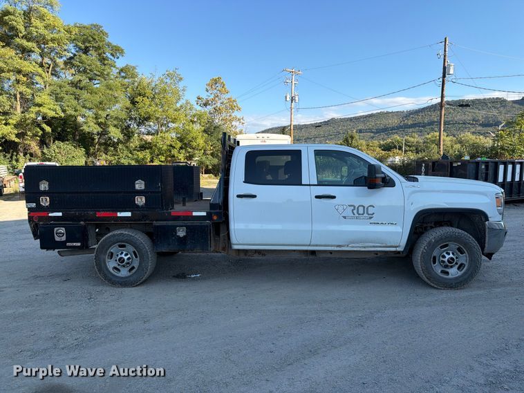 image for item FG3038 2018 GMC Sierra 2500HD Crew Cab flatbed pickup truck