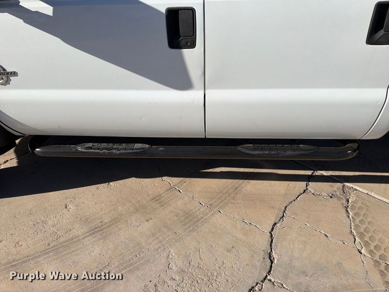 image for item FI2087 2011 Ford F550 Super Duty Crew Cab flatbed truck