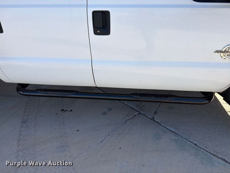 image for item FI2087 2011 Ford F550 Super Duty Crew Cab flatbed truck