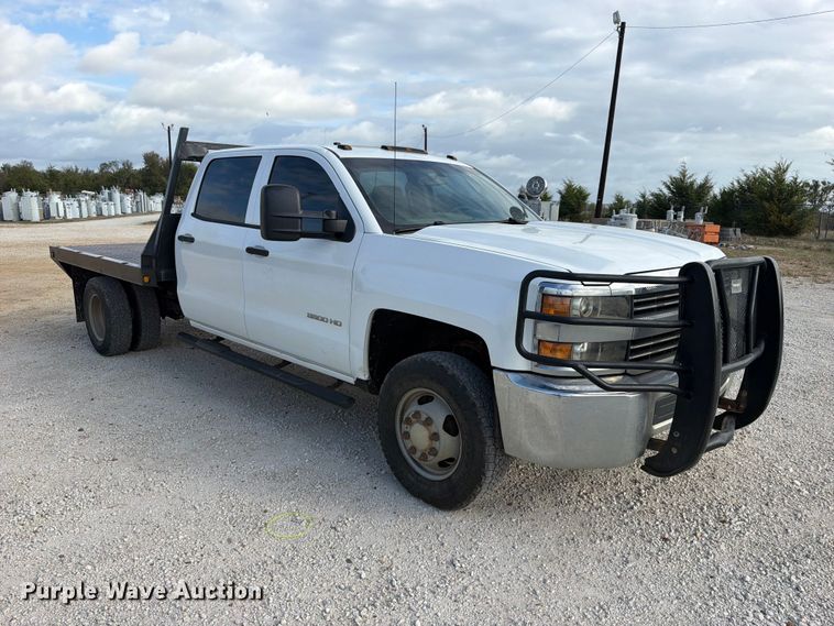 image for item FK5310 2017 Chevrolet Silverado 3500HD Crew Cab flatbed pickup truck