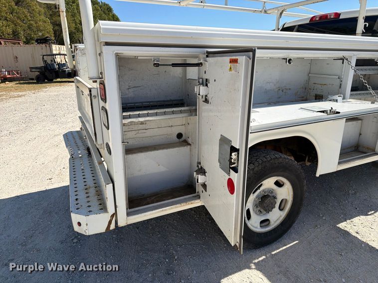image for item FN2648 2016 GMC Sierra 2500HD Crew Cab utility bed pickup truck