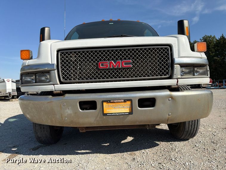 image for item FP3194 2006 GMC C5500 rollback truck