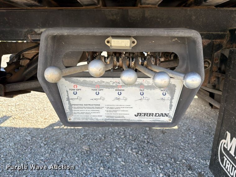 image for item FP3194 2006 GMC C5500 rollback truck
