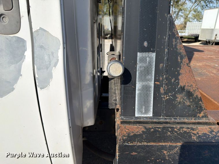 image for item FP3194 2006 GMC C5500 rollback truck