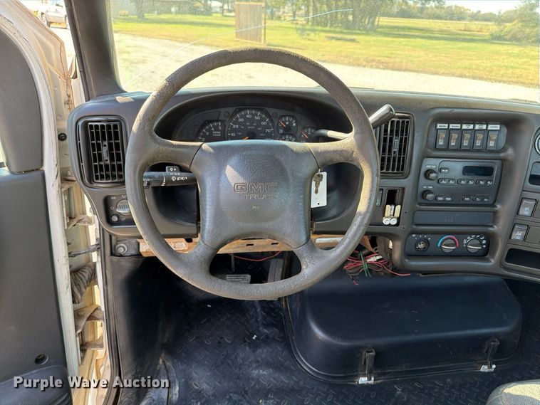 image for item FP3194 2006 GMC C5500 rollback truck