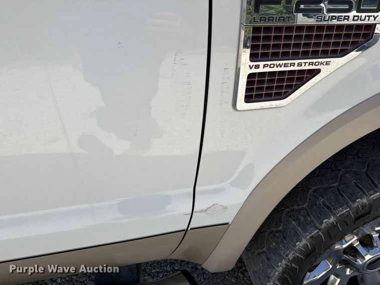 image for item FT6353 2010 Ford F250 Super Duty Crew Cab bale bed pickup truck