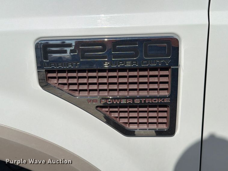 image for item FT6353 2010 Ford F250 Super Duty Crew Cab bale bed pickup truck