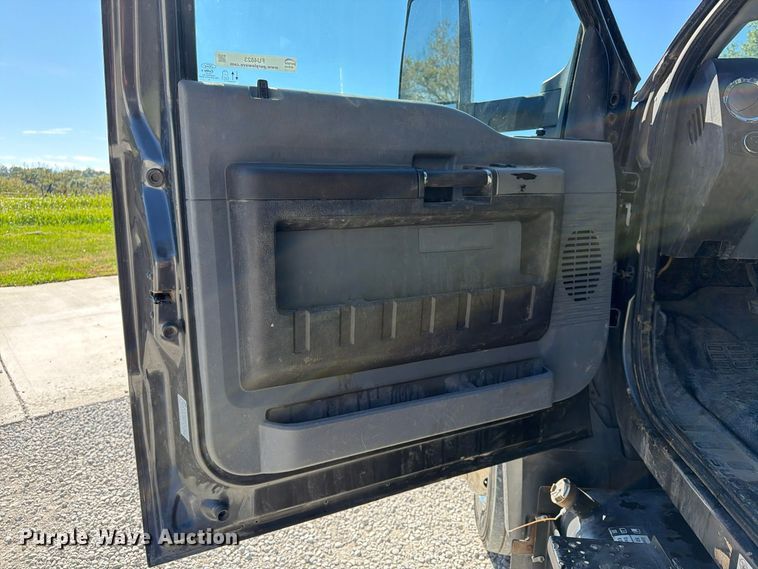 image for item FU4823 2021 Ford F650 Super Duty Crew Cab flatbed truck