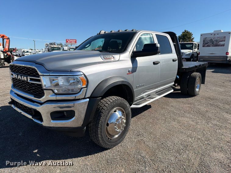 image for item FW3531 2022 RAM 5500 Crew Cab flatbed truck