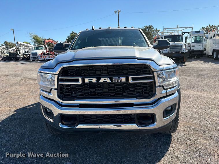 image for item FW3531 2022 RAM 5500 Crew Cab flatbed truck