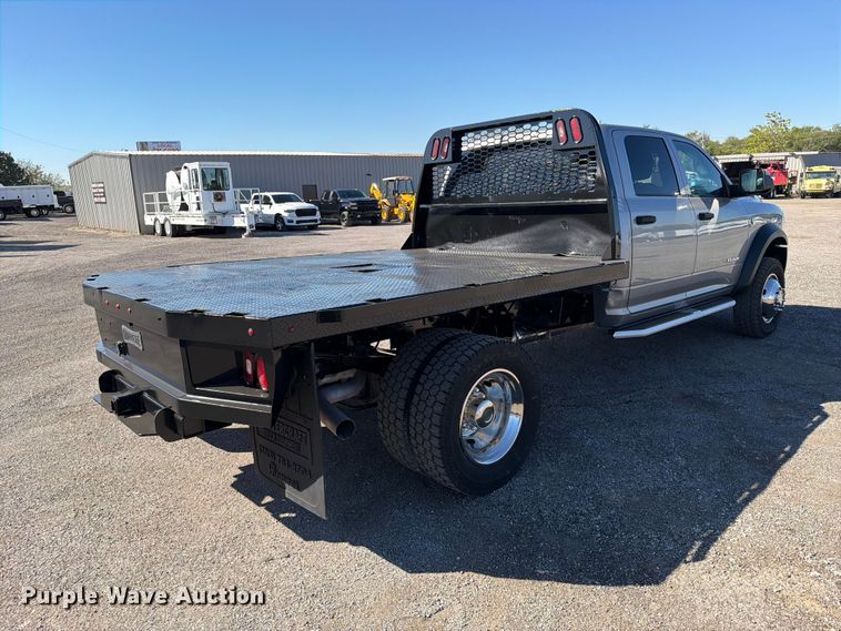 image for item FW3531 2022 RAM 5500 Crew Cab flatbed truck