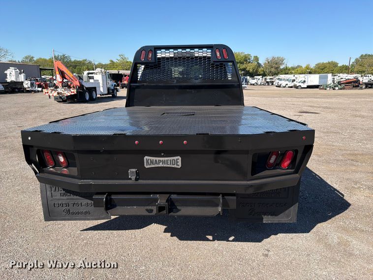 image for item FW3531 2022 RAM 5500 Crew Cab flatbed truck