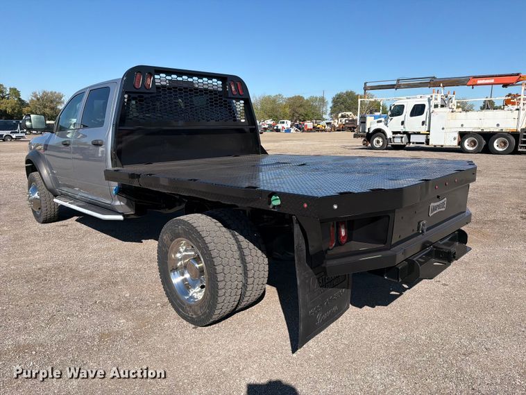 image for item FW3531 2022 RAM 5500 Crew Cab flatbed truck