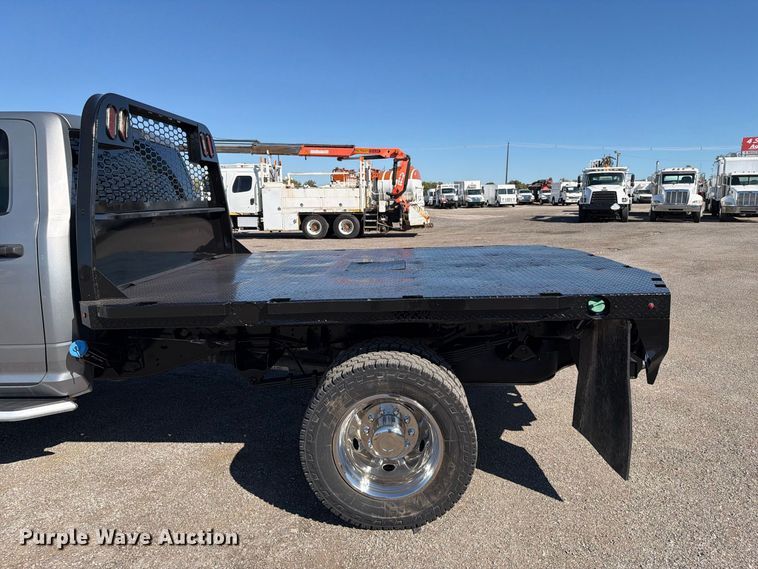 image for item FW3531 2022 RAM 5500 Crew Cab flatbed truck