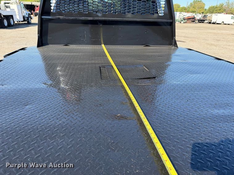 image for item FW3531 2022 RAM 5500 Crew Cab flatbed truck