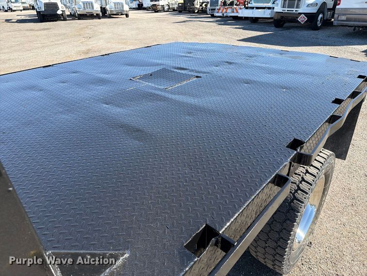 image for item FW3531 2022 RAM 5500 Crew Cab flatbed truck