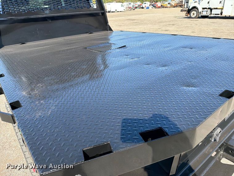 image for item FW3531 2022 RAM 5500 Crew Cab flatbed truck