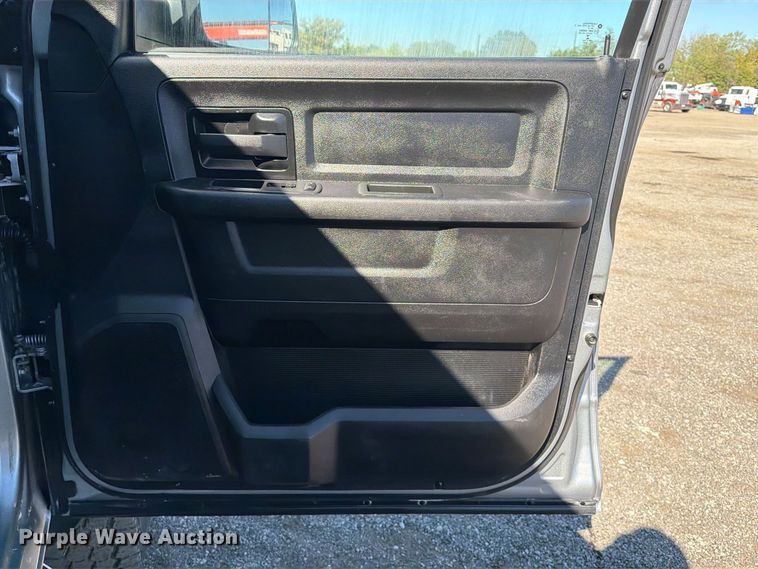 image for item FW3531 2022 RAM 5500 Crew Cab flatbed truck