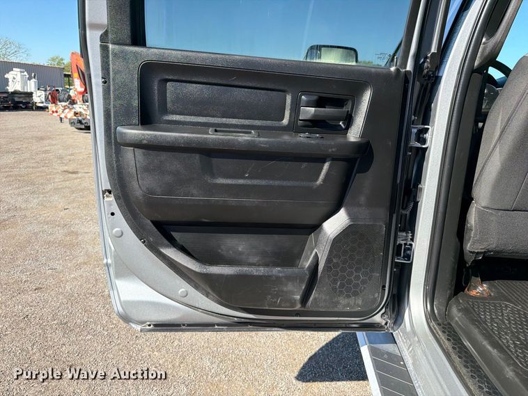 image for item FW3531 2022 RAM 5500 Crew Cab flatbed truck