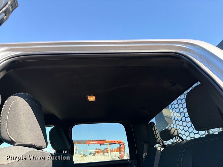 image for item FW3531 2022 RAM 5500 Crew Cab flatbed truck