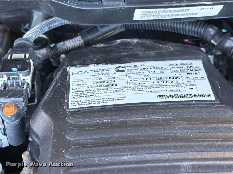image for item FW3531 2022 RAM 5500 Crew Cab flatbed truck