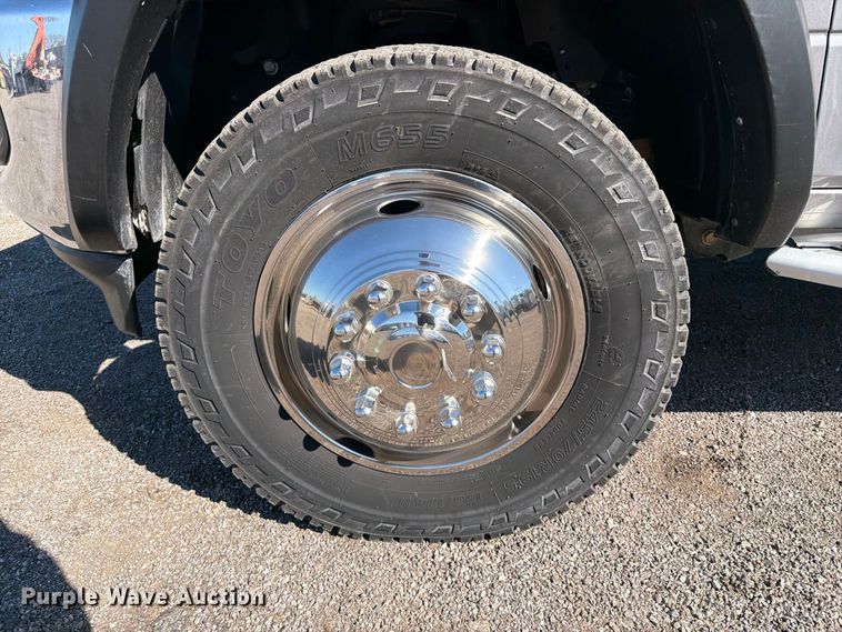 image for item FW3531 2022 RAM 5500 Crew Cab flatbed truck