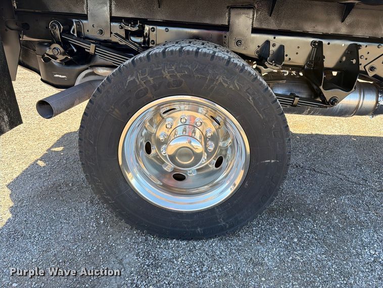 image for item FW3531 2022 RAM 5500 Crew Cab flatbed truck
