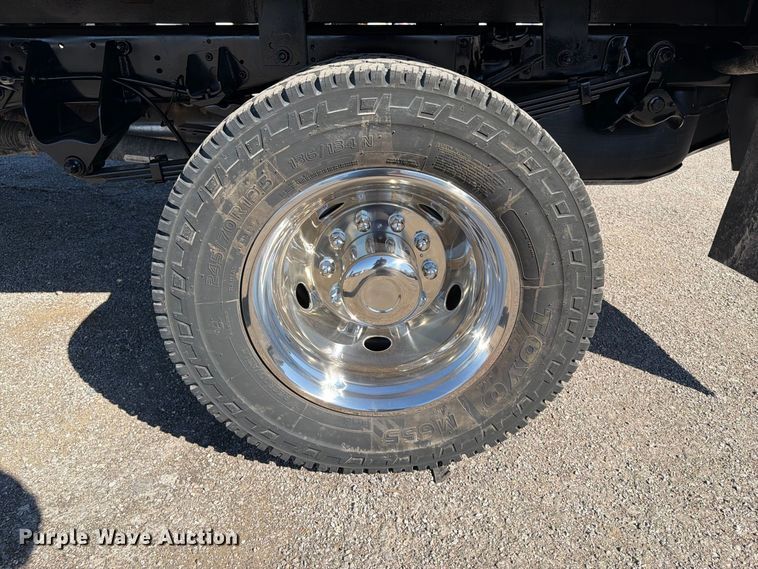 image for item FW3531 2022 RAM 5500 Crew Cab flatbed truck