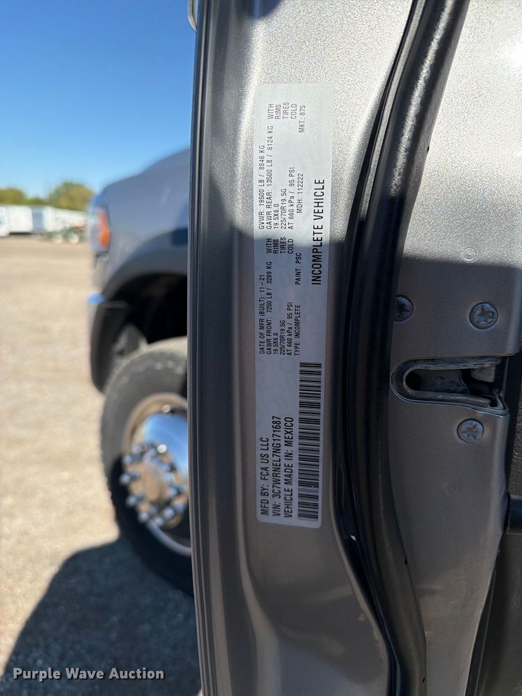 image for item FW3531 2022 RAM 5500 Crew Cab flatbed truck