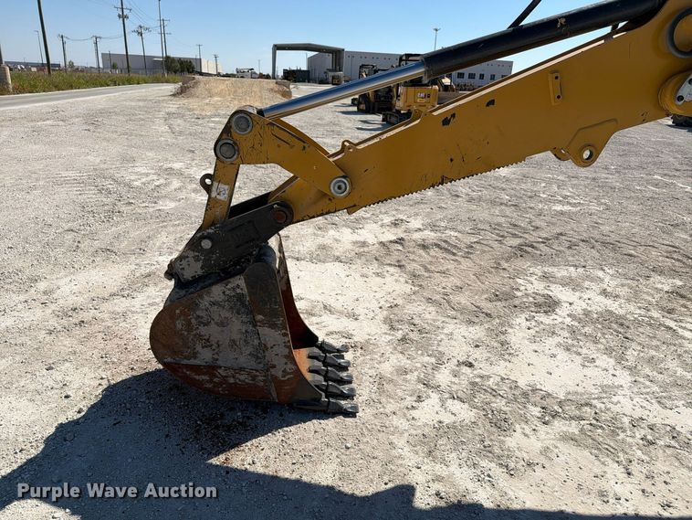image for item DU1578 2022 Caterpillar 420 XE backhoe
