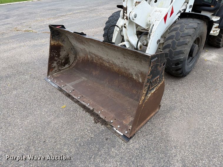 image for item EA0590 2015 Caterpillar 907M wheel loader