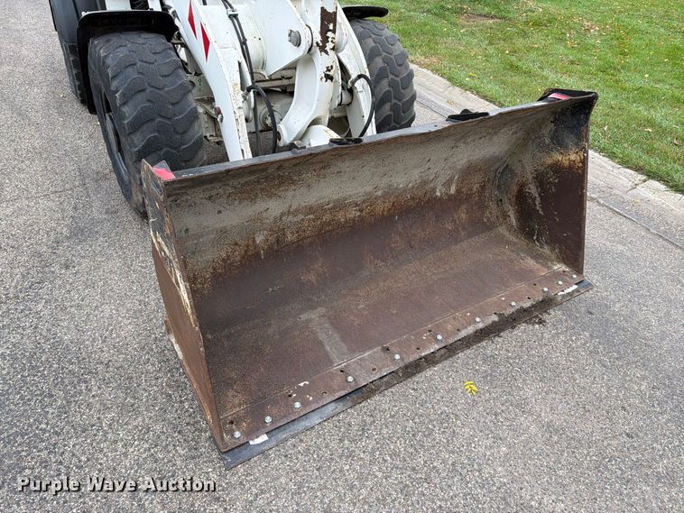 image for item EA0590 2015 Caterpillar 907M wheel loader