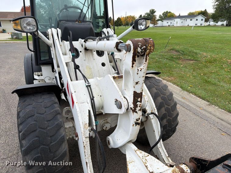 image for item EA0590 2015 Caterpillar 907M wheel loader