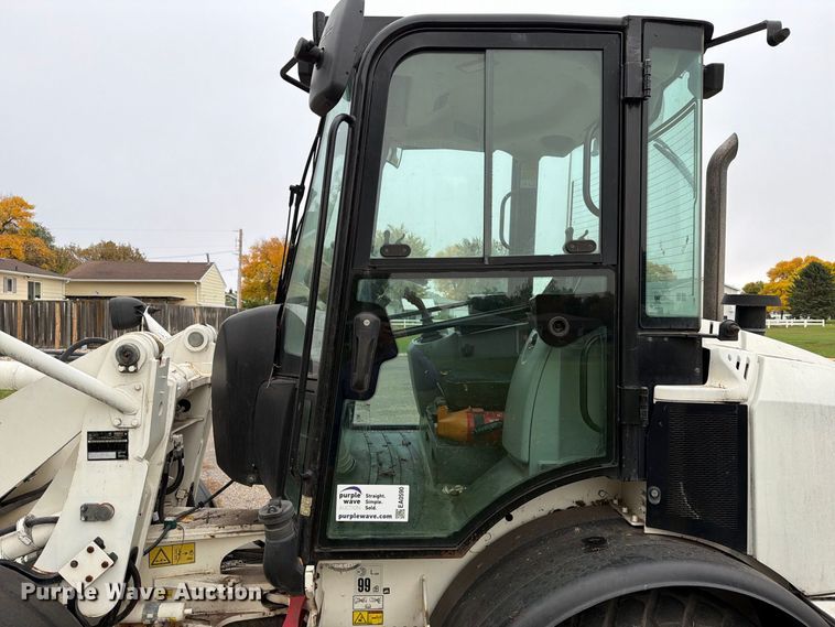 image for item EA0590 2015 Caterpillar 907M wheel loader