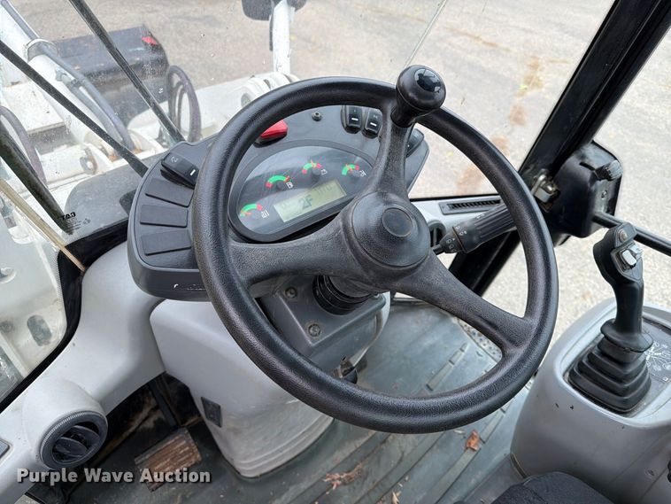 image for item EA0590 2015 Caterpillar 907M wheel loader