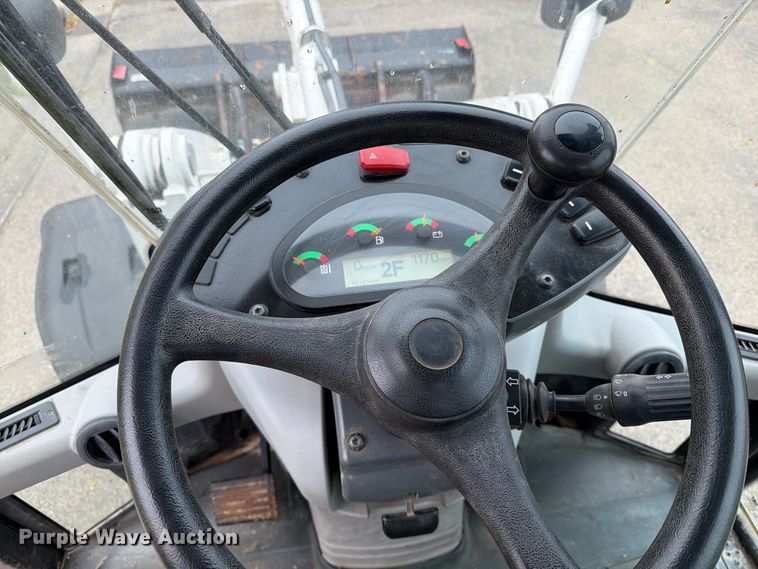 image for item EA0590 2015 Caterpillar 907M wheel loader