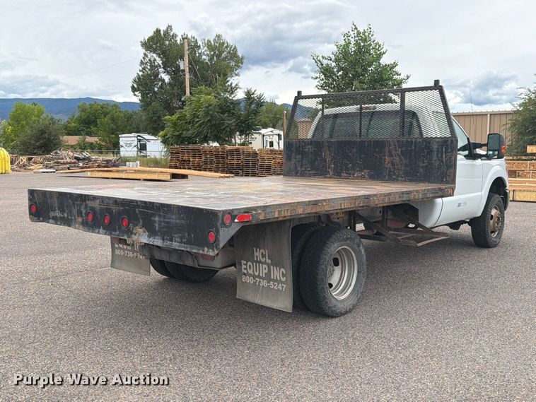 image for item ED0066 2013 Ford F350 Super Duty dump flatbed pickup truck