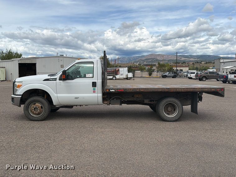 image for item ED0066 2013 Ford F350 Super Duty dump flatbed pickup truck