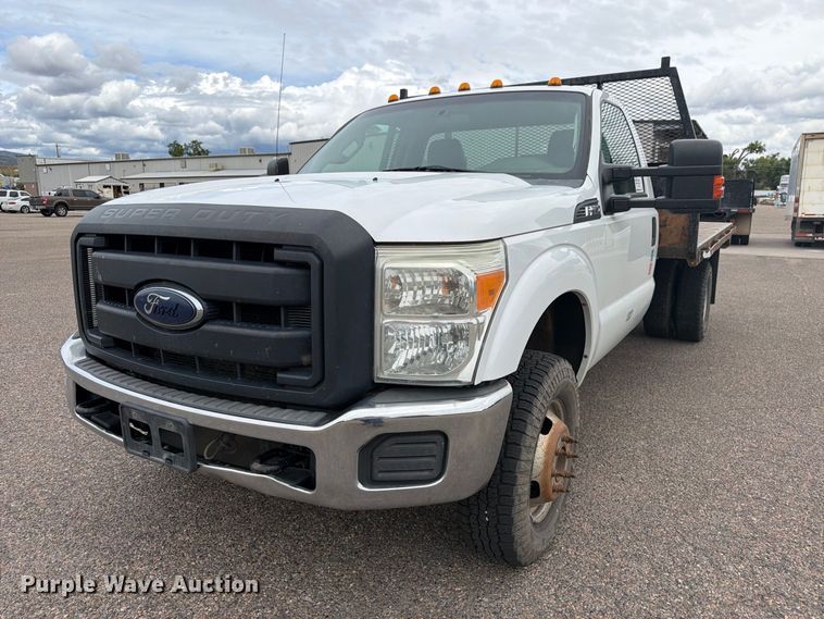 image for item ED0066 2013 Ford F350 Super Duty dump flatbed pickup truck