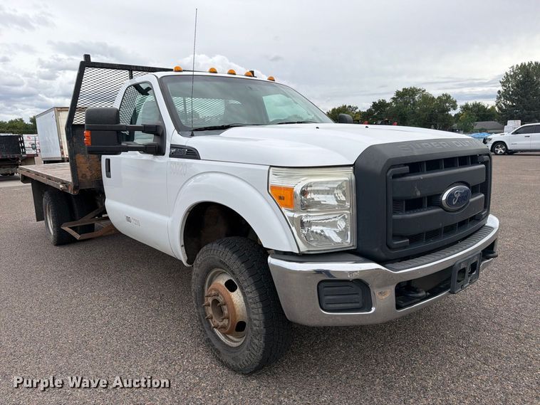 image for item ED0066 2013 Ford F350 Super Duty dump flatbed pickup truck