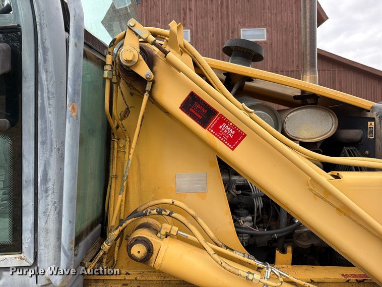 image for item ED0218 1998 New Holland 655E backhoe