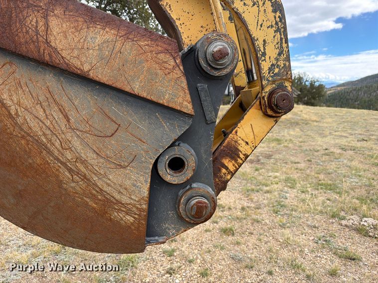 image for item ED0218 1998 New Holland 655E backhoe