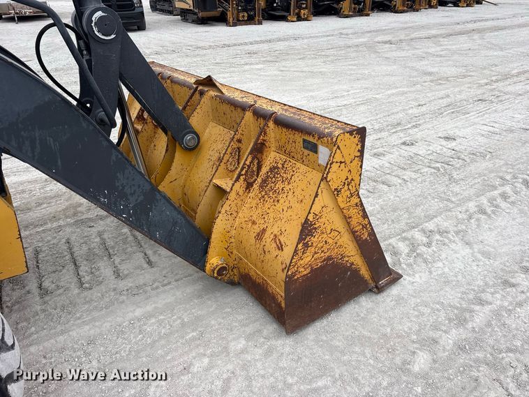 image for item ES8286 2015 John Deere 310K backhoe