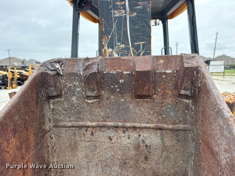 image for item ES8286 2015 John Deere 310K backhoe
