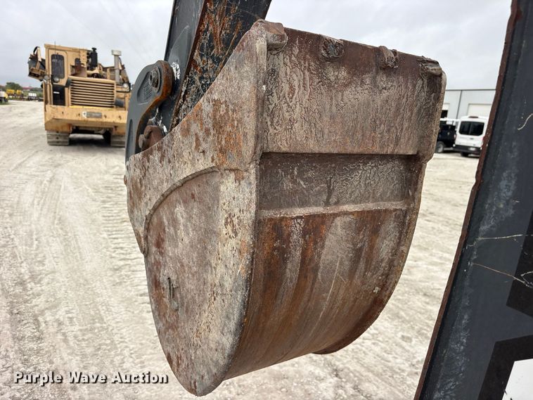 image for item ES8286 2015 John Deere 310K backhoe