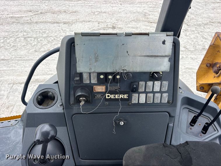 image for item ES8286 2015 John Deere 310K backhoe