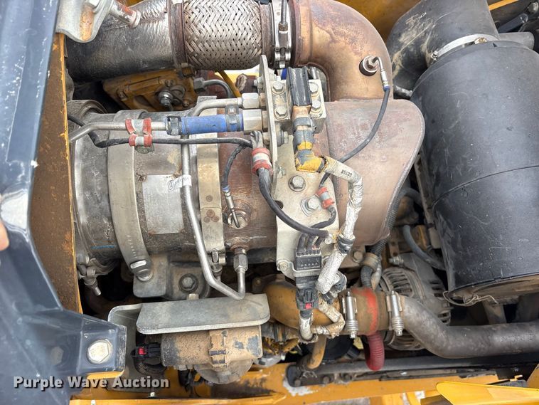 image for item ES8286 2015 John Deere 310K backhoe