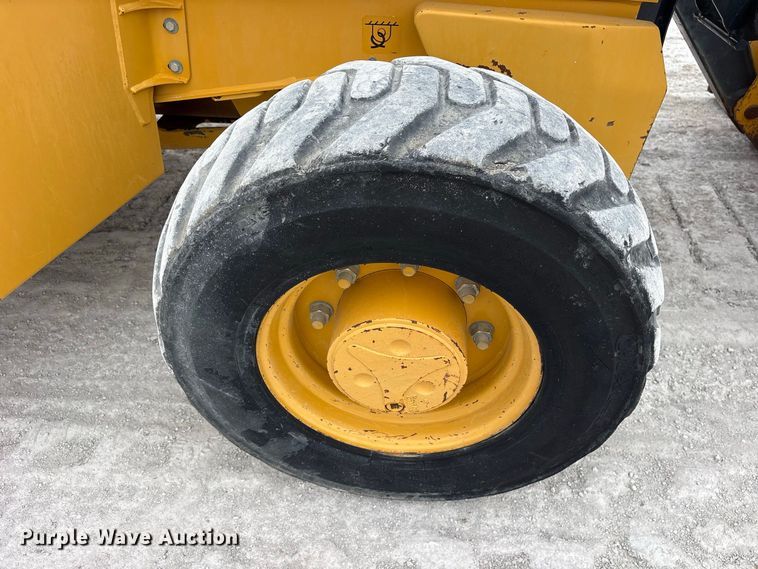 image for item ES8286 2015 John Deere 310K backhoe