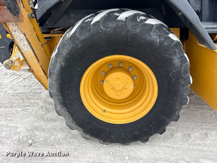 image for item ES8286 2015 John Deere 310K backhoe
